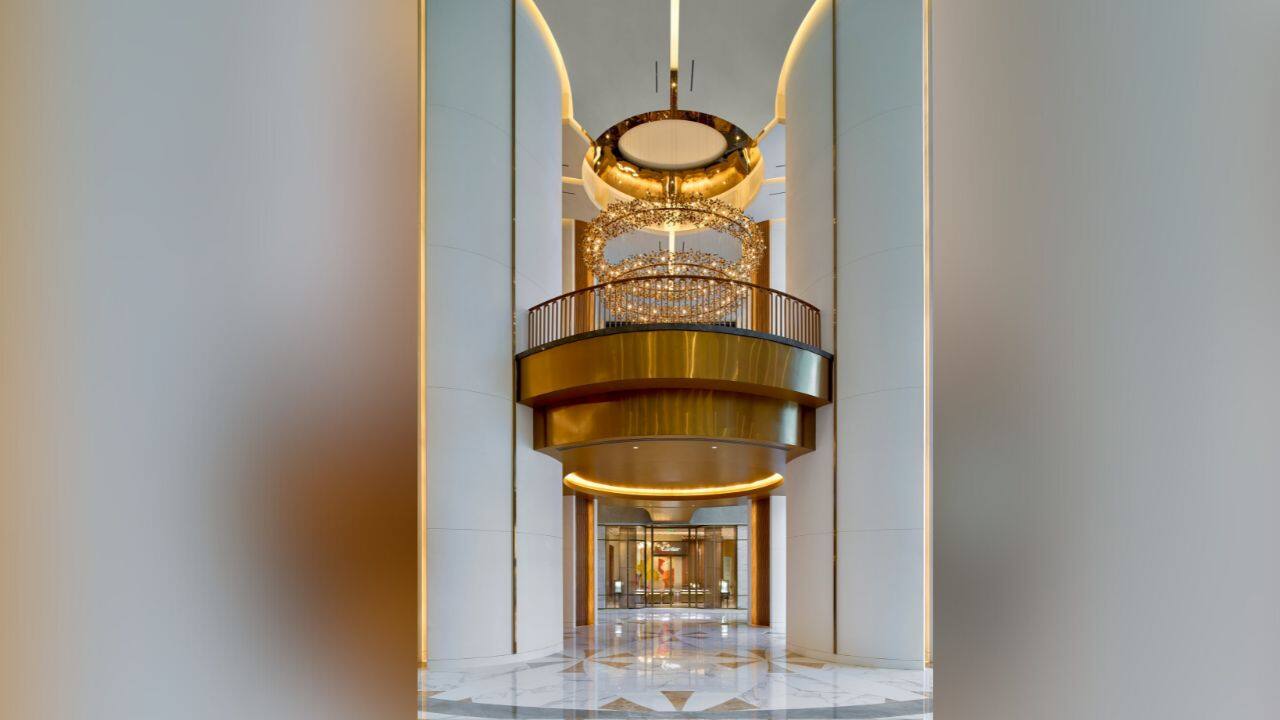 Marble-clad floors, soaring vaulted ceilings, and an exquisite play of soft lighting combine to create a setting that embodies the spirit of luxury. (X/ Reliance Industries Limited)