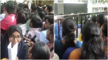 Documents in hand, hundreds of job seekers wait for their turn at the walk-in interview in Hyderabad. (Screengrabs from video shared by @IndianTechGuide on X)