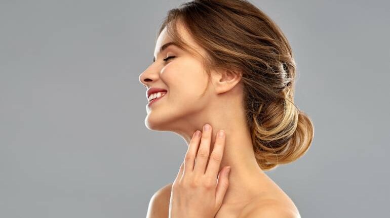 Premium Photo  Woman smile applying sun cream on face Skincare