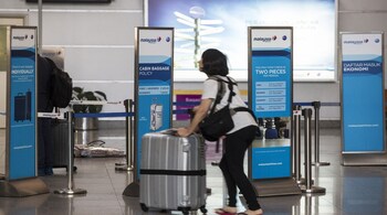 Malaysia is counting on extra tourist arrivals — and their spending — to support economic growth. (Image courtesy: Bloomberg)