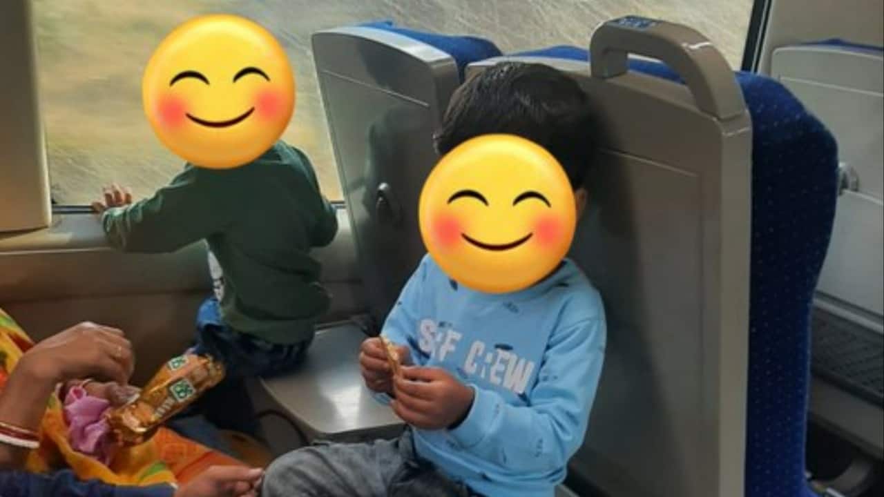 Vande Bharat passengers seat children on snack trays, face Railway official’s disapproval Vande Bharat passengers seat children on snack trays, face Railway official’s disapproval