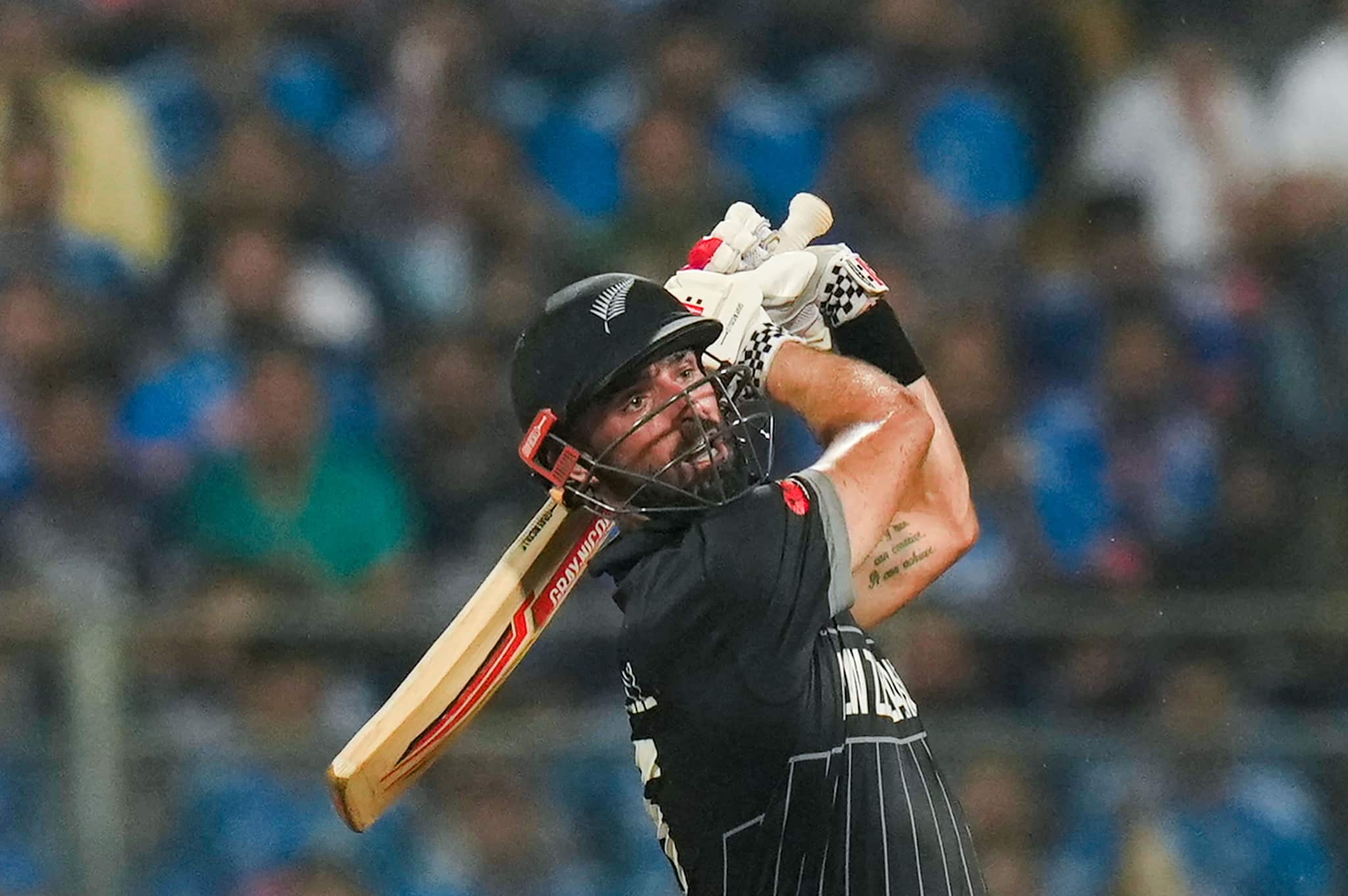 Daryl Mitchell took center stage as the standout performer for New Zealand, displaying remarkable consistency with an impressive innings of 134. His outstanding performance not only kept his team firmly in the game but also instilled a sense of uncertainty among Indian supporters. (Image: PTI) Daryl Mitchell took center stage as the standout performer for New Zealand, displaying remarkable consistency with an impressive innings of 134. His outstanding performance not only kept his team firmly in the game but also instilled a sense of uncertainty among Indian supporters. (Image: PTI)
