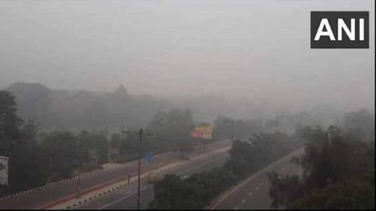Delhi AQI: Residents breathe easy as sudden shower improves air quality in national capital - Vimarsana News