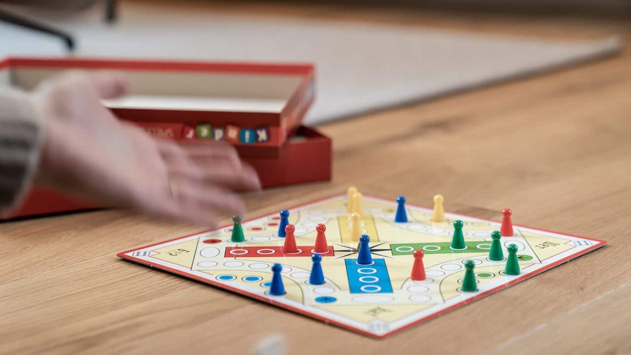 Allocate 20 per cent for classic board games such as Ludo and Chess or Dart Board, for offline entertainment. (Photo by Omaela Apartments via Pexels)