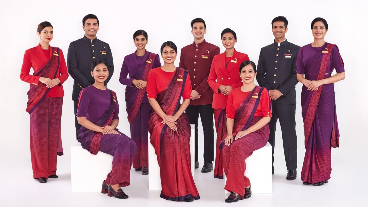 Do you think that Sarees as a uniform worn by Air India flight's Air  Hostesses is more graceful and visually appealing when compared to western  uniforms in some other airlines? - Quora