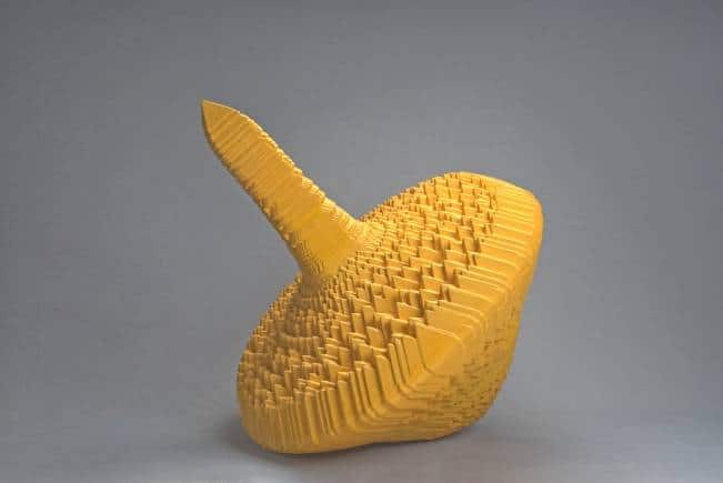 Topo (2015), Hyderabad-based Harsha Durugadda's sculpture in painted birchwood, is an exaggerated toy 
