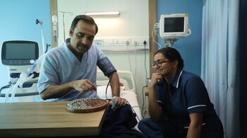 Pankaj Tripathi and Parvathy in a still from Kadak Singh.