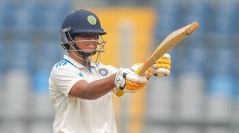 Richa Ghosh after hitting fifty on Test debut in front of her family. This is Ghosh’s third 50 across formats. (Photo: PTI)