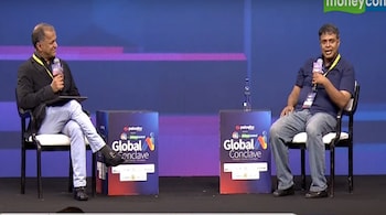 Bala Parthasarathy of People + AI (l) in conversation with Vivek Raghavan of Sarvam AI at the CNBC TV18- Moneycontrol Global AI Conclave in Bengaluru on December 16