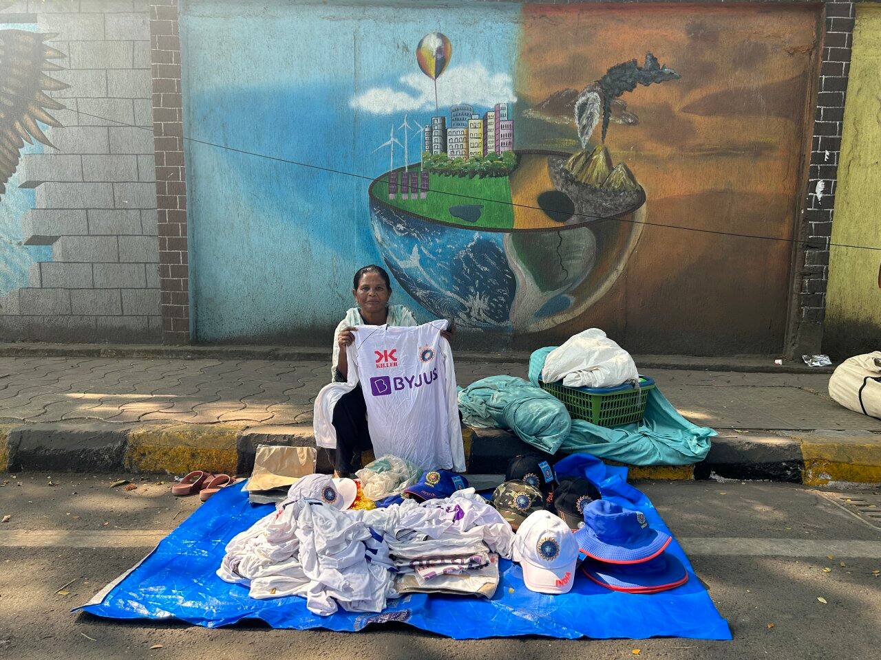 Meera, a familiar vendor of replica jerseys on the circuit, admitted to barely having any business on Day 1. On Days 2 and 3, she decided to set up shop only briefly. (Photo by Annesha Ghosh)