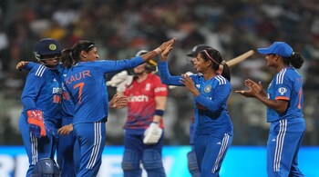 Shreyanka Patil celebrates with teammates the wicket of England's Freya Kemp during the 3rd T20I cricket match between India and England, at Wankhede Stadium, in Mumbai, on Dec 10, 2023. (PTI photo)