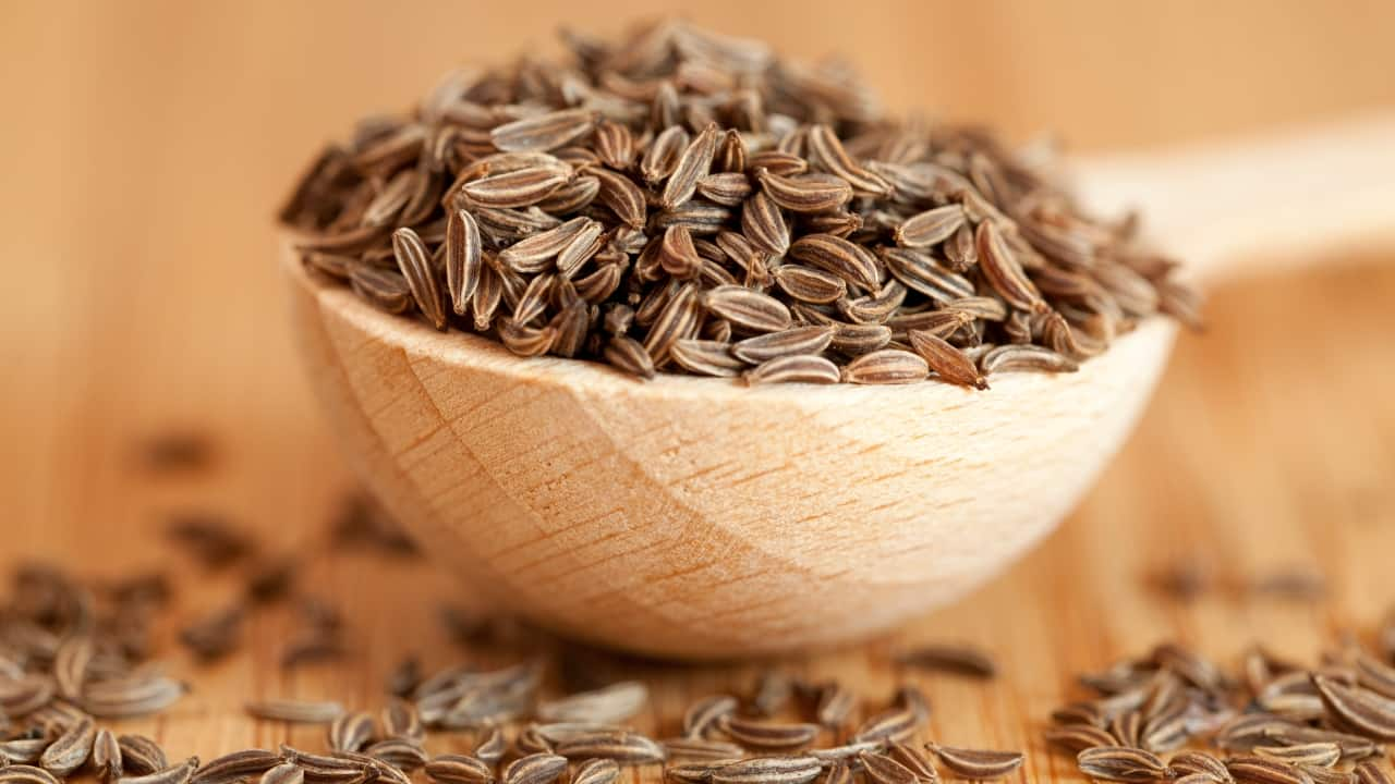 Perfect Jeera Rice Indian Cumin Rice close up in the bowl on the table.  Vertical top view from above Stock Photo - Alamy