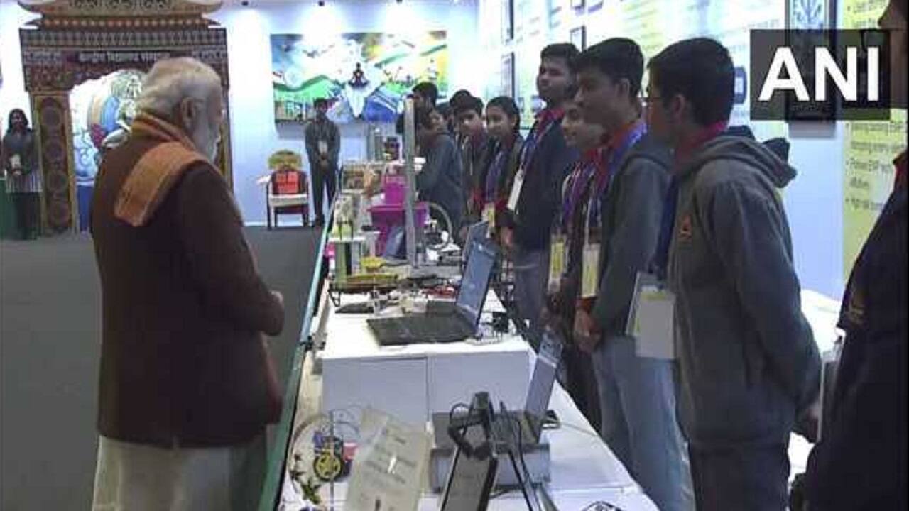 Before addressing Pariksha pe Charcha, PM Narendra Modi inspects an exhibition at the Bharat Mandapam in Delhi