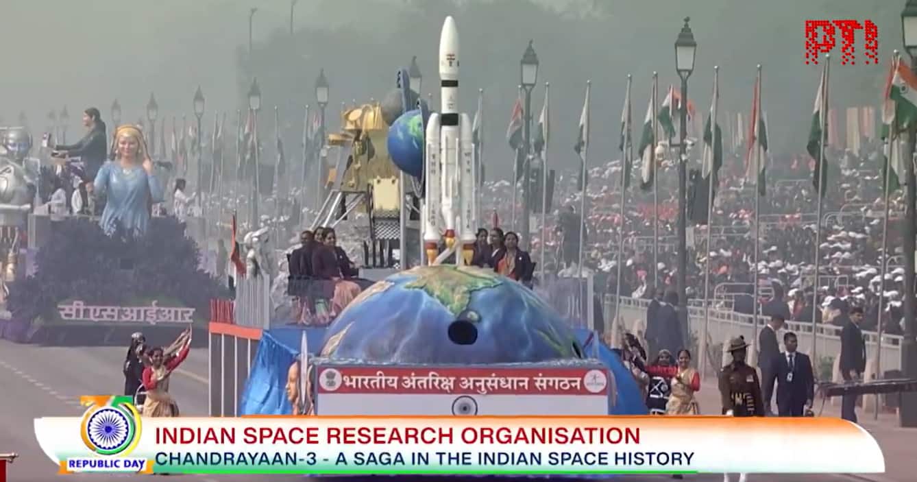 The Indian Space Research Organisation (ISRO) tableau graces Kartavya Path, showcasing the triumphant depiction of Chandrayaan-3's successful soft landing near the Moon's south pole. The tableau unfolds ISRO's dedication to space exploration and technological achievements during the Republic Day Parade. (Image: PTI)