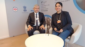 Minister for Electronics and Information Technology Ashwini Vaishnaw (L) and Moneycontrol's Chandra R Srikanth (R) at the World Economic Forum in Davos on January 18.