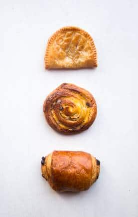 (Top to bottom) Pain au chocolat; sultana croissant; apple turnover at Délifrance in Delhi.