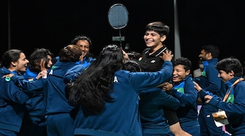 Anmol Kharb (C) celebrates after winning against Thailand's Pornpicha Choeikeewong in their women's singles final match at the 2024 Badminton Asia Team Championships in Shah Alam, Selangor, on February 18. (Image: AFP)
