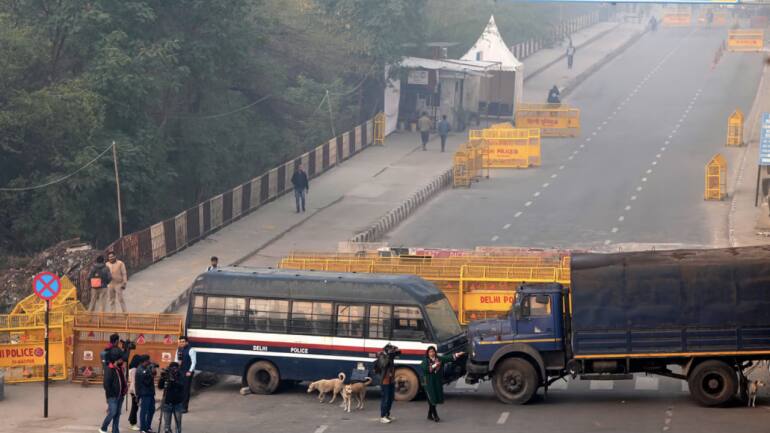 `Delhi Chalo' farmers try to break through road blocks, clash with Haryana cops - Vimarsana News