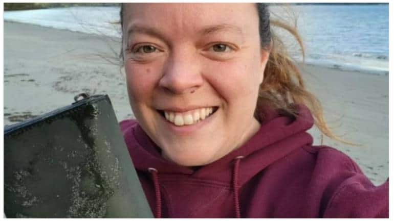 Woman finds lost wallet on beach, 8 months after it fell from a boat: 'Knew it right away' - Vimarsana News