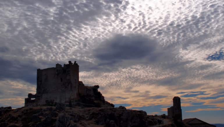Trevejo Bajo las nubes Castillo en Trevejo pertenece al pueblo de Villamiel Cáceres 28 September 2016 Photo credit Jesusutu Wikimedia Commons