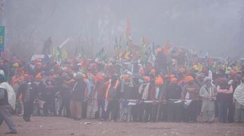 Agitating farmers suspended their foot march to Delhi from the Shambhu border on Sunday after some of them sustained injuries in teargas shelling by Haryana security personnel