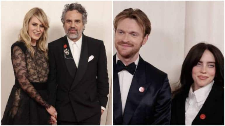 Celebrities Seen Wearing Red Pins At Oscars 2024 Red Carpet. Here's Why