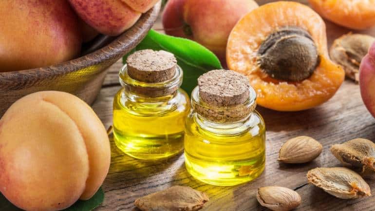 Apricot oil: Extracted from succulent apricot kernels, this oil keeps the skin moisturised. Rich in Vitamin E, it maintains skin elasticity and reduces stretch marks, shields the skin from environmental stressors, and enhances hair shine and manageability, making detangling a breeze (Image: Canva)