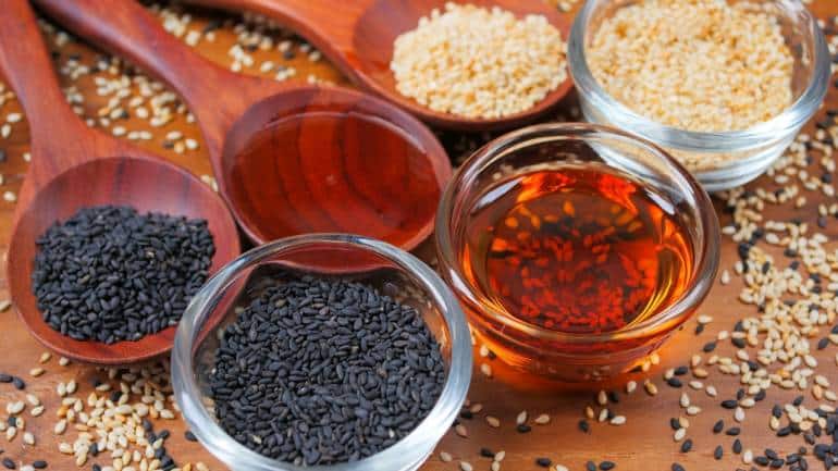 Sesame Seed oil: Packed with nutrients, Sesame Seed oil offers deep nourishment, penetrating deeply for radiant, healthy skin. It detoxifies the skin by drawing out impurities, fights free radicals for a youthful complexion, and adds natural shine to hair for vitality (Image: Canva)
