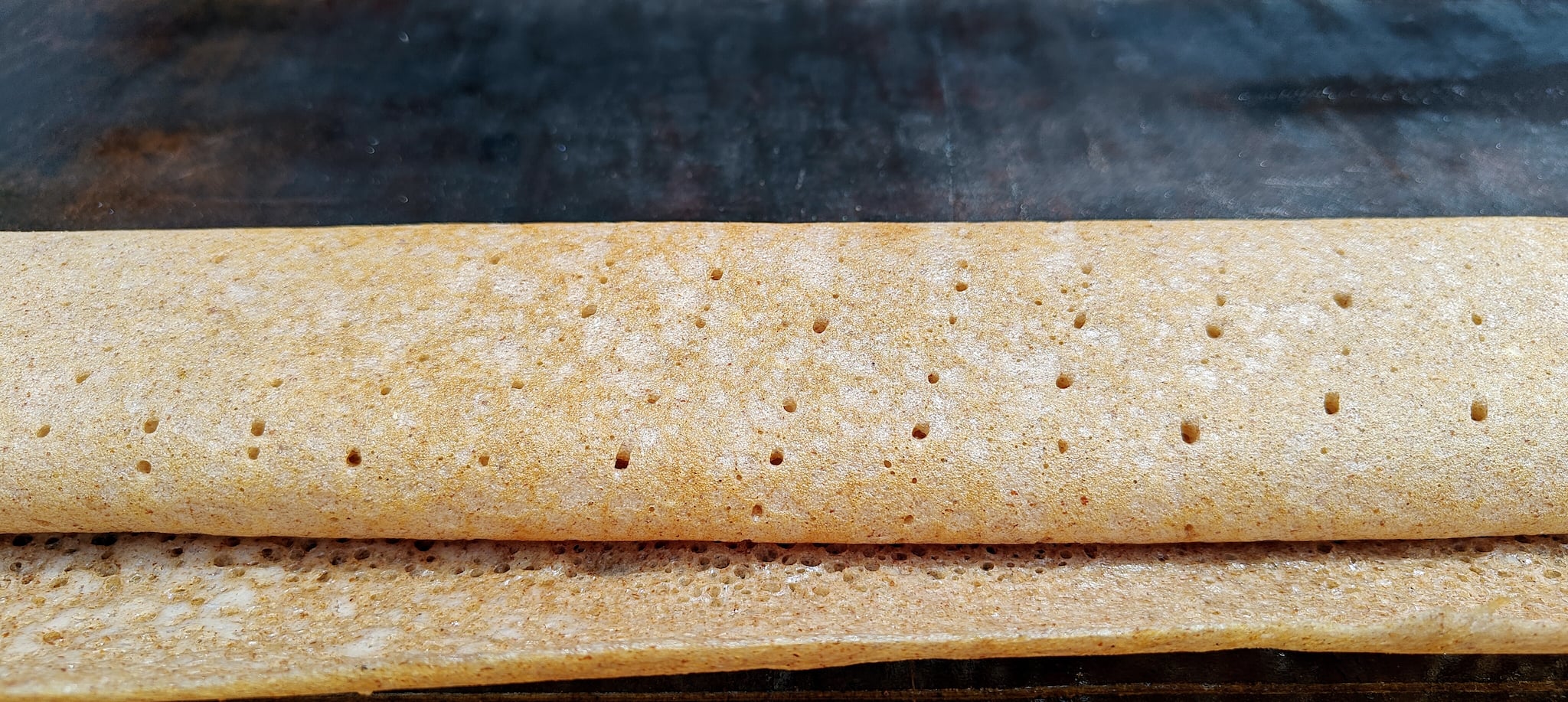 MTR @ 100 makes world's longest dosa at 123.03 feet, enters Guinness World Records™ MTR @ 100 makes world's longest dosa at 123.03 feet, enters Guinness World Records™