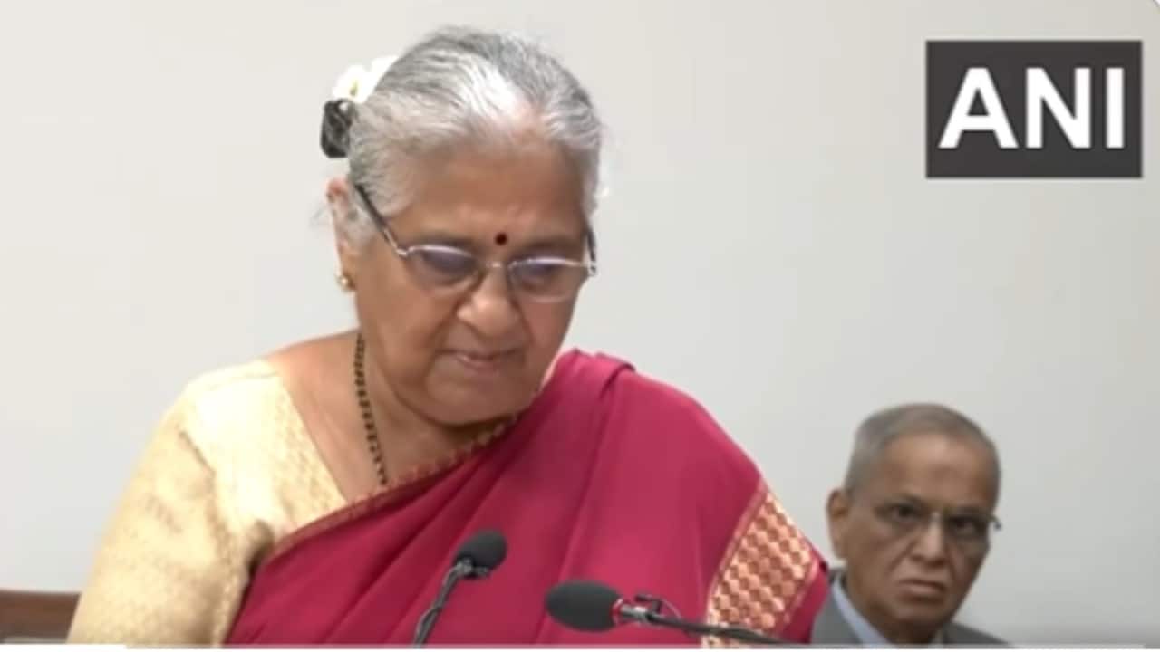 Sudha Murty takes oath in Kannada as Rajya Sabha member as Narayana Murthy looks on. Watch