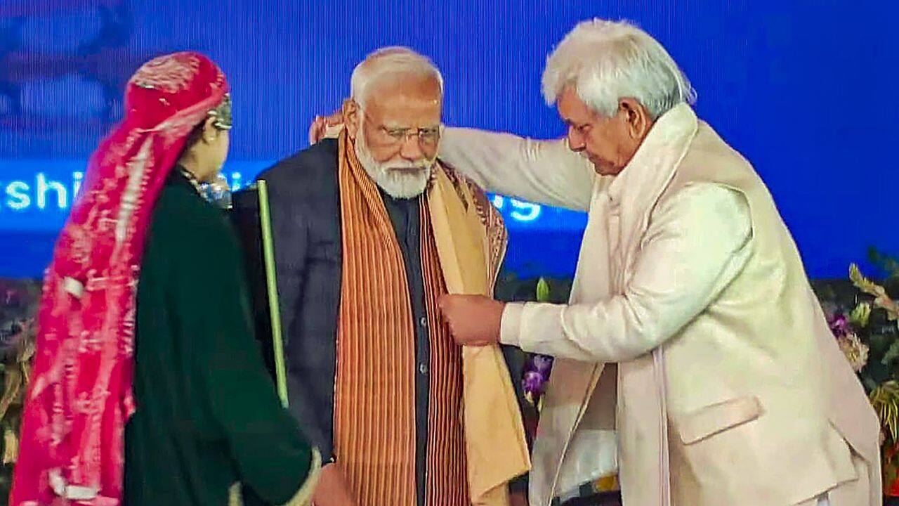  Speaking at a public rally in Srinagar's Bakshi Stadium, Prime Minister Narendra Modi launched the Swadesh Darshan Scheme, which would dedicate six projects to the country. In addition, he announced the scheme's second phase, which will include around 30 projects in Jammu &amp; Kashmir and other parts of the country. (Image: PTI)