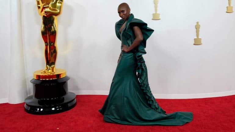 Known for her typically daring fashion sense, Cynthia Erivo surprised fans with a custom Louis Vuitton gown. However, the leather fabric combined with an unusual shade of green failed to impress. Some likened her look to a misplaced character from &quot;Wicked,&quot; solidifying this choice as a red carpet disappointment (Image: AP)