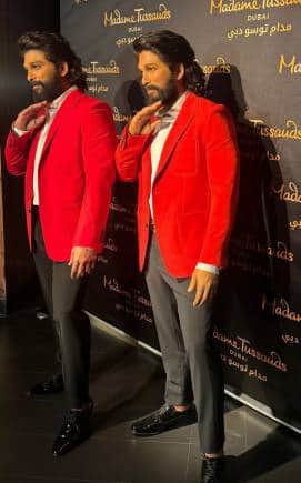 Telugu star Allu Arjun with his wax statue.
