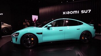 Chinese smartphone maker Xiaomi starts delivering the first of more than 100,000 EVs ordered