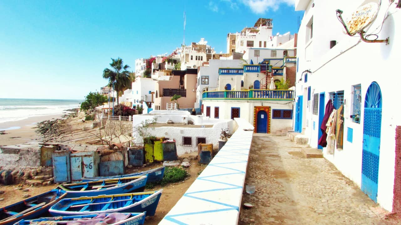 The blue city of Taghazout, Morocco. (Photo: Louis Hansel via Unsplash)
