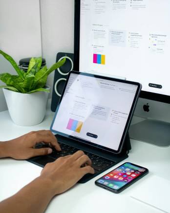 The new iPads will have a new keyboard with a larger trackpad and a partially-aluminium enclosure. (Photo via Unsplash)