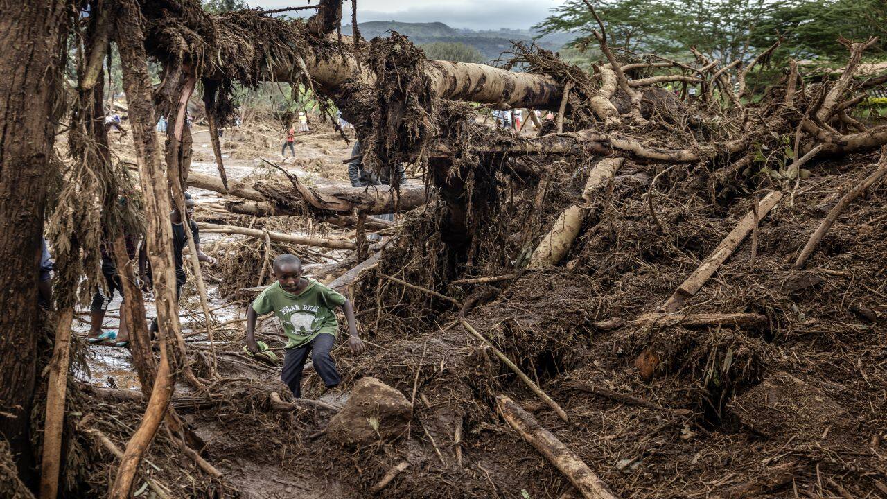 The deluge cut off a road, uprooted trees, washed away homes and sent vehicles flying, devastating the village of Kamuchiri.