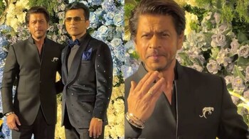 Shah Rukh Khan stuns in black classic suit at Anand Pandit's daughter's  wedding reception, watch