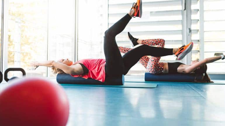 Dead Bug •Lie on your back with arms up. • Bend knees at a 90-degree angle (tabletop position). • Extend right leg and lower left arm overhead. • Switch sides for 12–15 reps (Image: Canva)