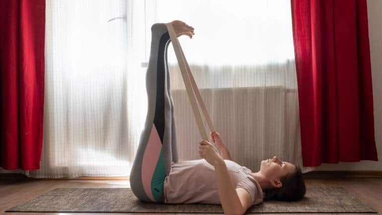 Benefits of Viparita Karani: It helps calm the mind and body (Image: Canva)