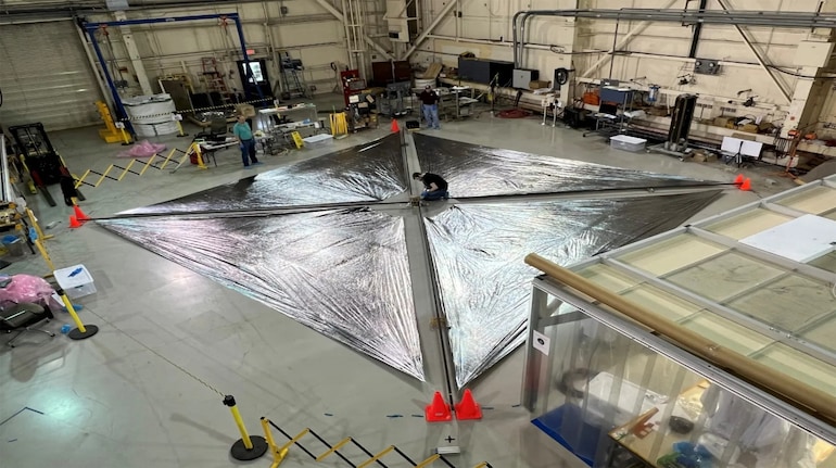 Engineers at NASA’s Langley Research Center test deployment of the Advanced Composite Solar Sail System’s solar sail. (Image credit: NASA)