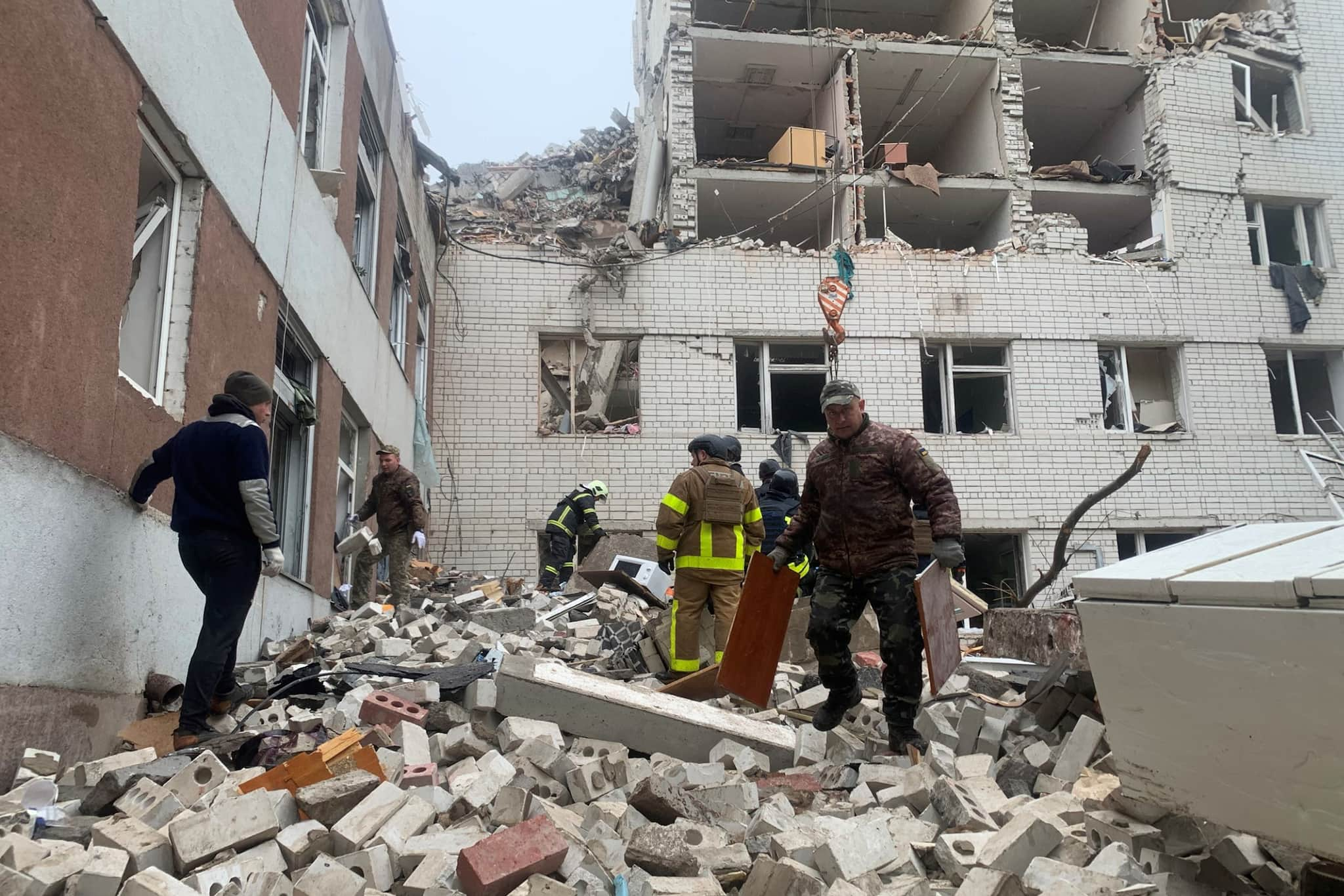 Ukrainian-rescuers-clear-the-rubble-of-a