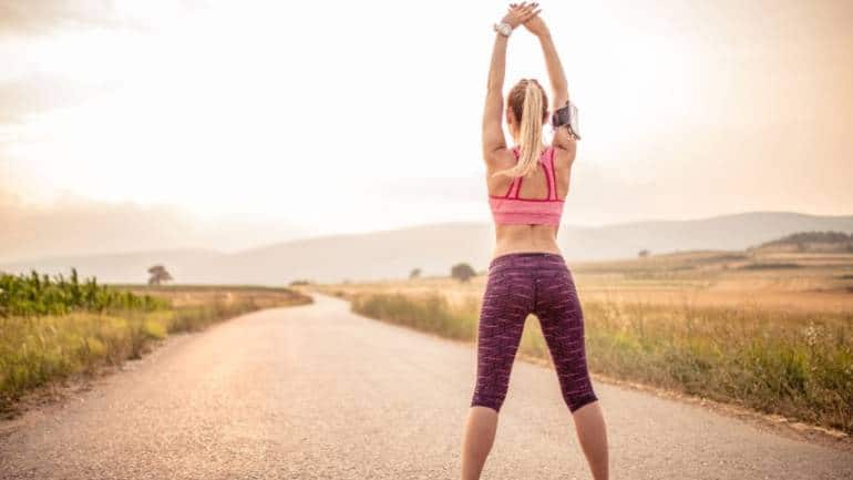 Stretching: The simple act of stretching often gets overlooked. However, it is really important for staying flexible and avoiding injuries, especially if you tend to sit a lot. You can stretch almost anywhere – on the couch, at your desk, or while waiting for the kettle to boil. Even just a little bit of stretching each day can help reduce stress, fix your posture, and make you feel better (Image: Canva)