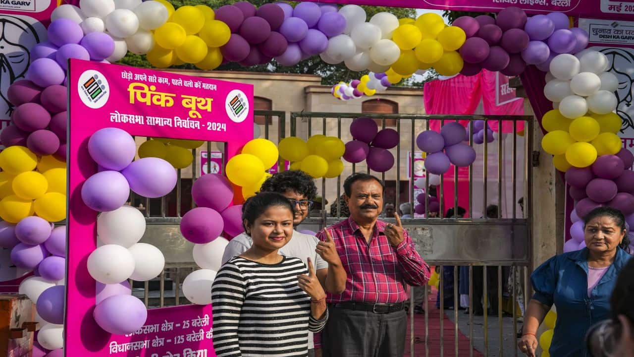 Bareilly: People show their ink-marked finger after casting votes for the 3rd phase of Lok Sabha elections, in Bareilly, Tuesday, May 7, 2024. (PTI Photo/Arun Sharma)(PTI05_07_2024_000053B)