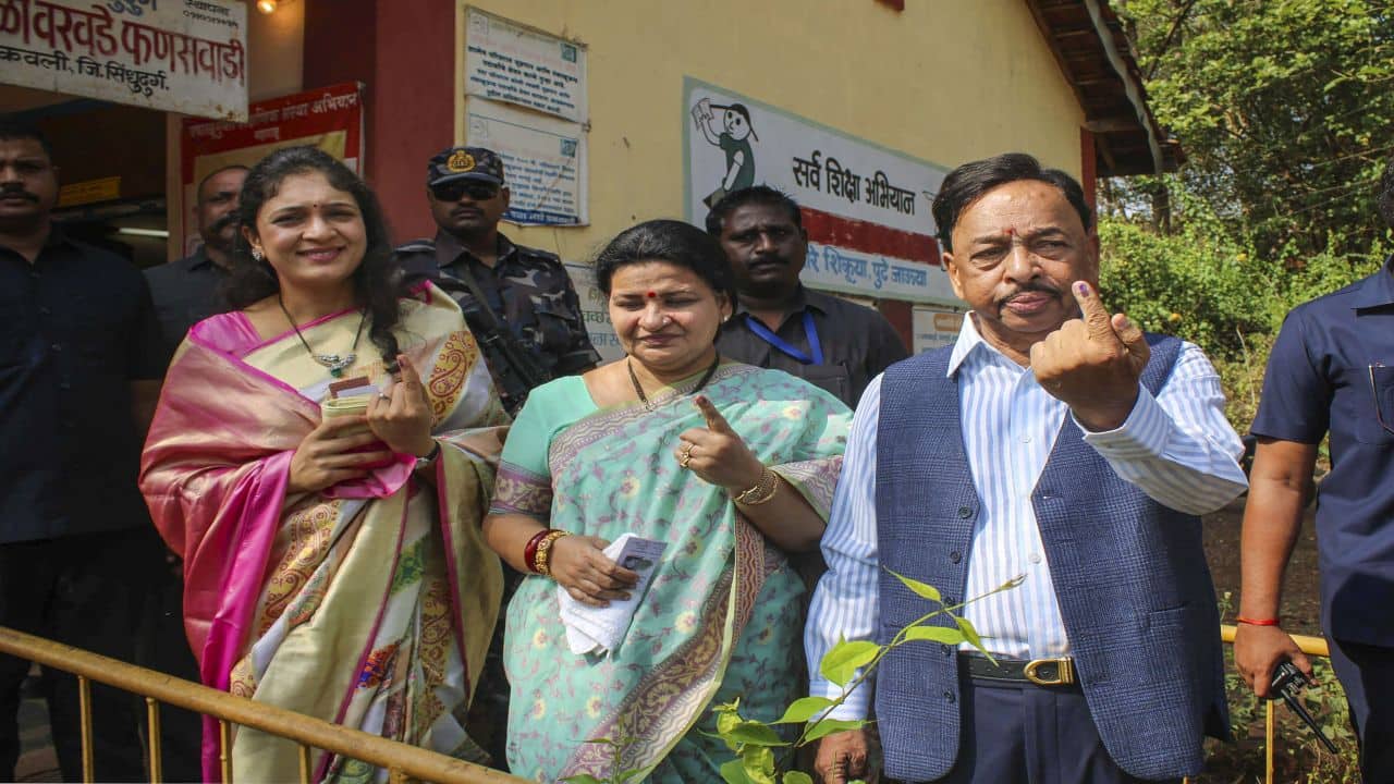 **EDS: IMAGE VIA @MeNarayanRane POSTED ON TUESDAY, MAY 7, 2024** Ratnagiri: Union Minister Narayan Rane and his family members show their fingers marked with indelible ink after casting their votes for the third phase of Lok Sabha polls, in Ratnagiri, Maharashtra. (PTI Photo)(PTI05_07_2024_000185B)