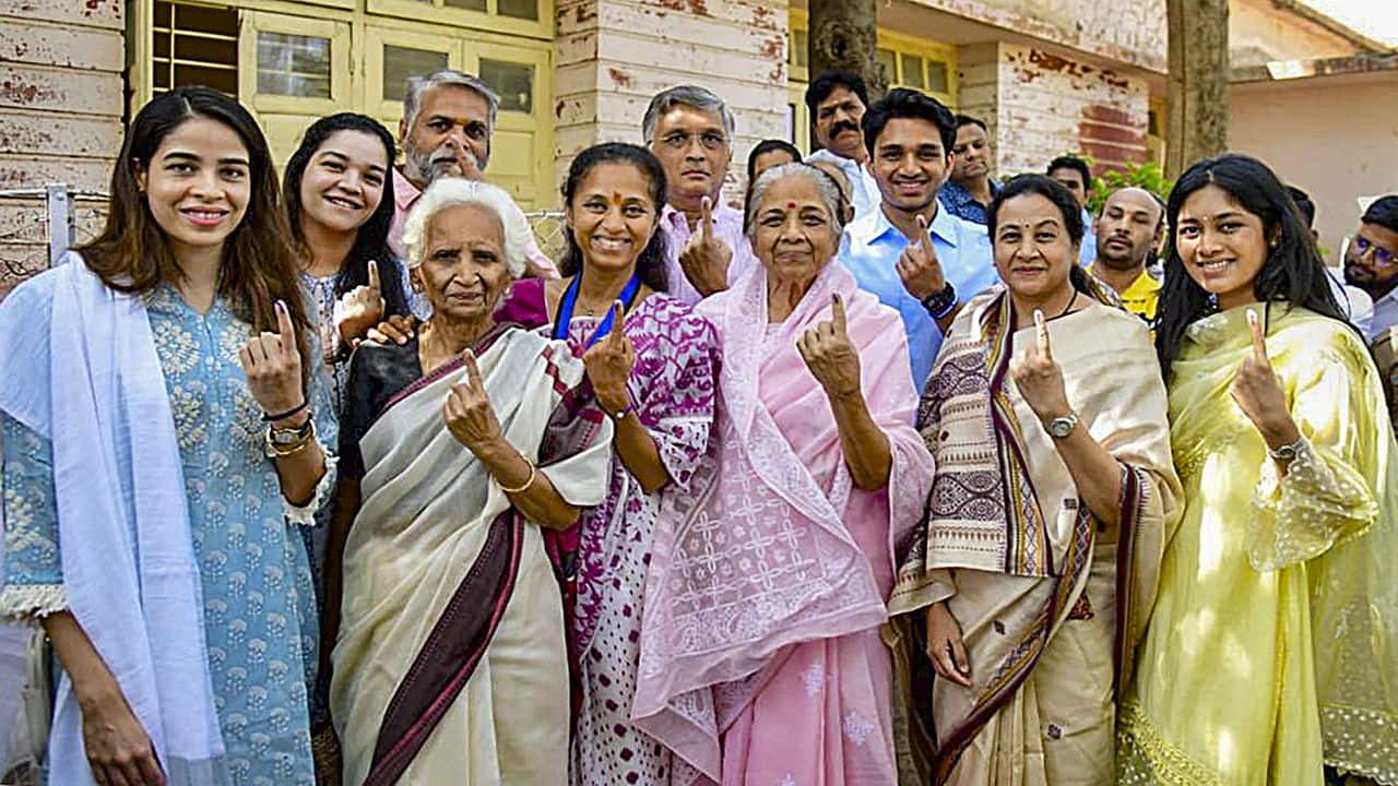 NCP-SCP MP and candidate from Baramati Lok Sabha seat, Supriya Sule shows her inked finger after casting her vote at a polling station in Baramati, Maharashtra (PTI Photo)