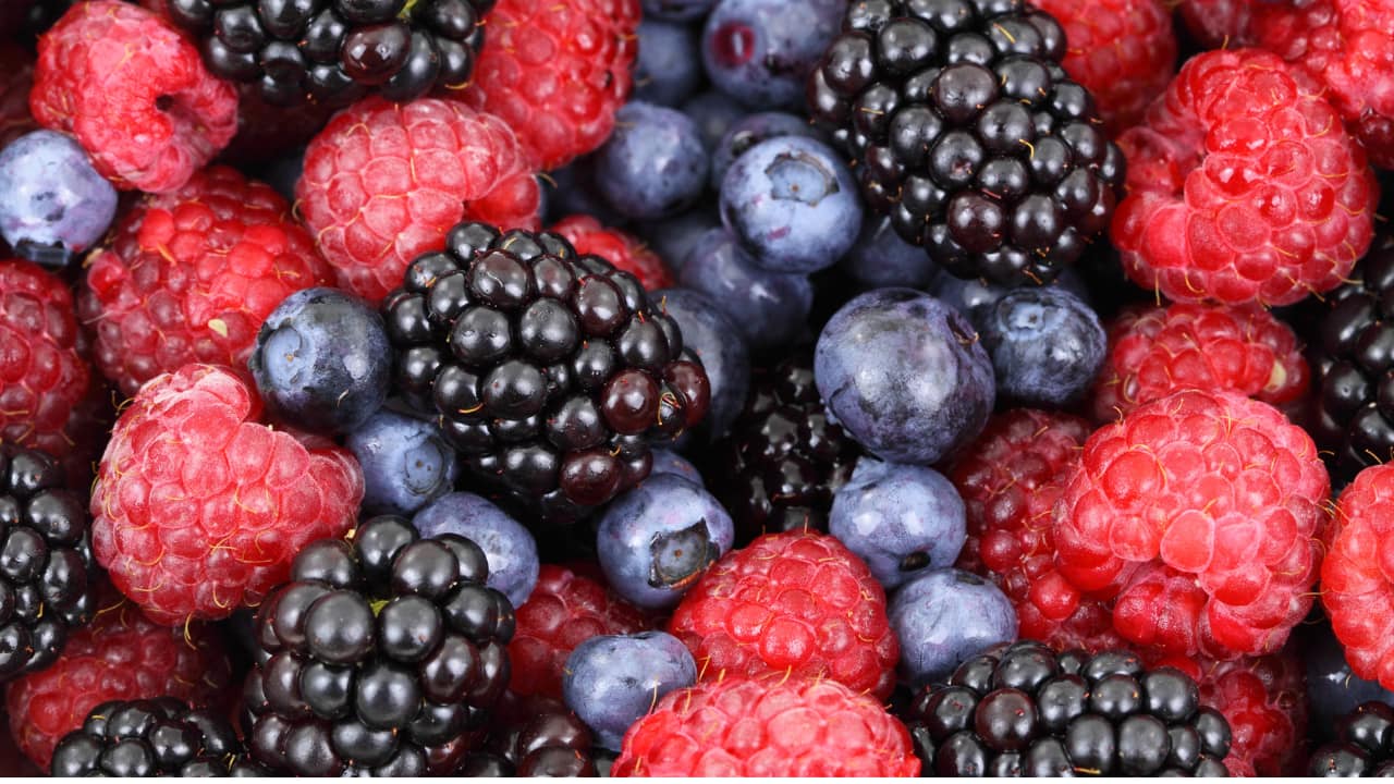 Berries: While fruits contain natural sugars, berries are lower in sugar compared to many other fruits and are packed with fibre and antioxidants. They can be a satisfying and nutritious addition to your diet. (Image: Canva)