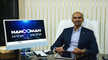 SML co-founder Vishnu Vardhan launching the Hanooman Gen AI platform