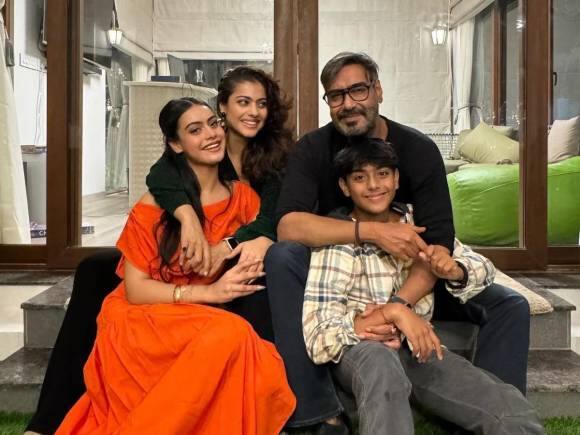 Kajol with her husband Ajay Devgn and her elder daughter Nysa along with her son Yug.