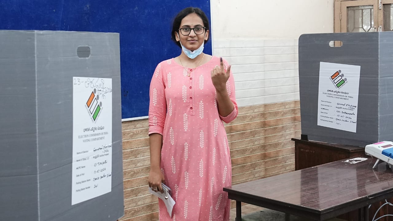 A woman shows her finger marked with indelible ink after casting her vote at a polling station during the fourth phase of Lok Sabha elections and Andhra Pradesh Assembly elections, at Sullurupeta in Tirupati district, Monday, May 13, 2024. Polling underway for 25 Lok Sabha, 175 Assembly seats in Andhra Pradesh in single phase. (PTI Photo/R Senthilkumar